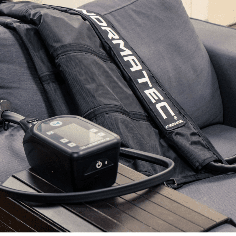 NormaTec compressor on chair